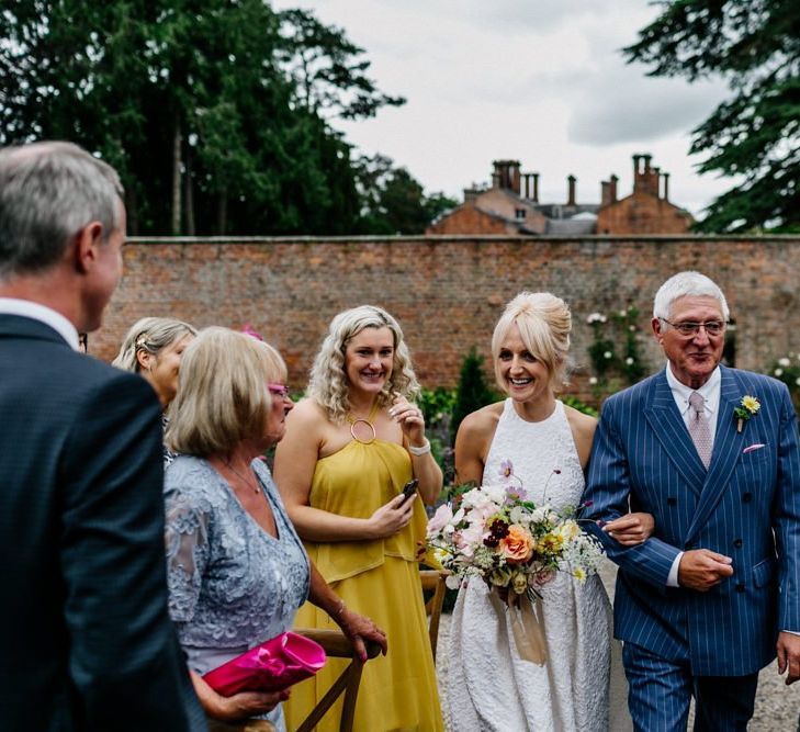 Bride Walks Down the Aisle With Father