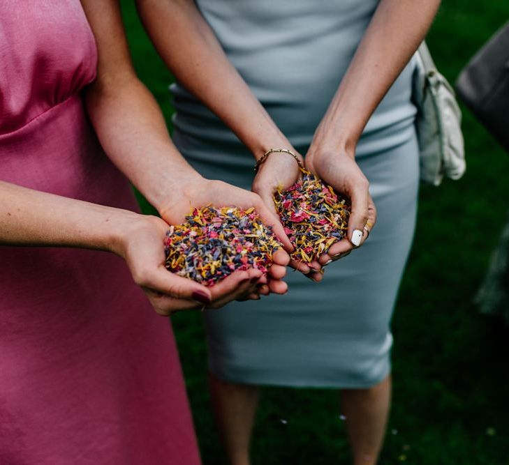 Guests Hold Flower Petals To Throw as Confetti