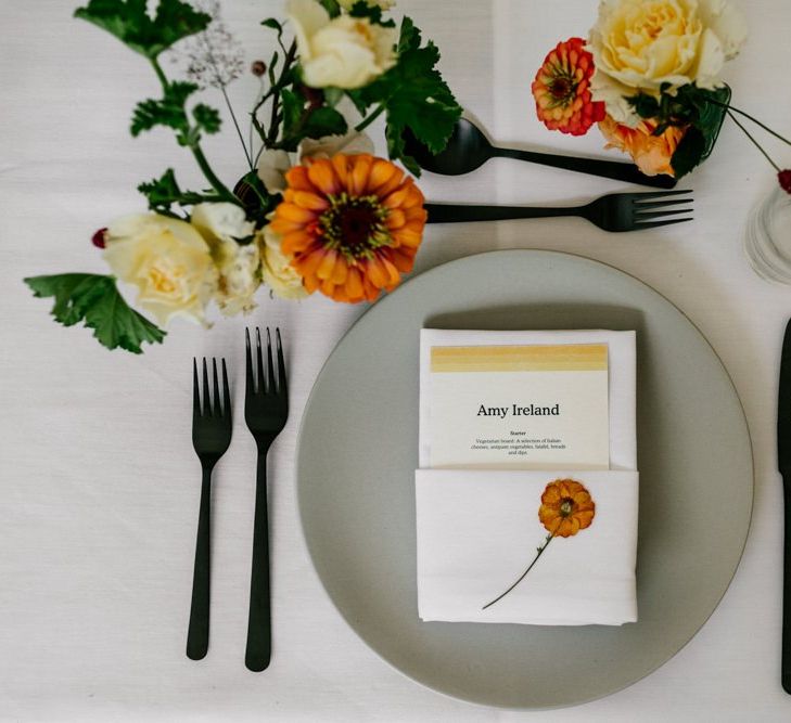 Wedding Table Setting with Bright Flowers