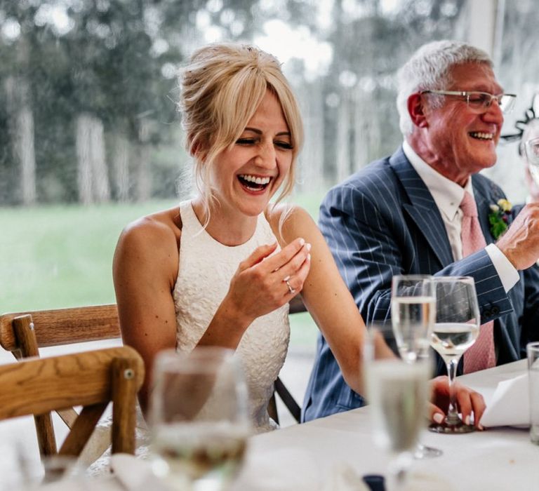 Bride Laughing At Wedding Speeches