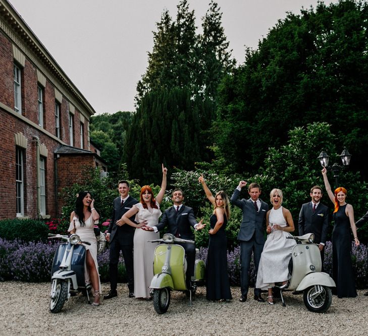 Bridal Party and Groomsmen In Front Of Vintage Vespers