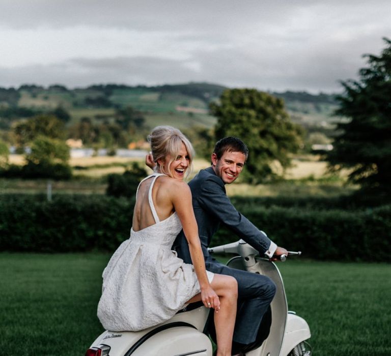 Bride Wearing Low Back Halterneck Dress on Vesper with New Husband