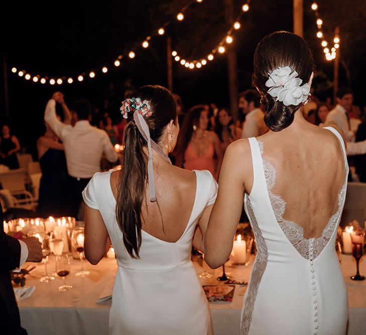 Detail back of bridal gowns with bridal up do