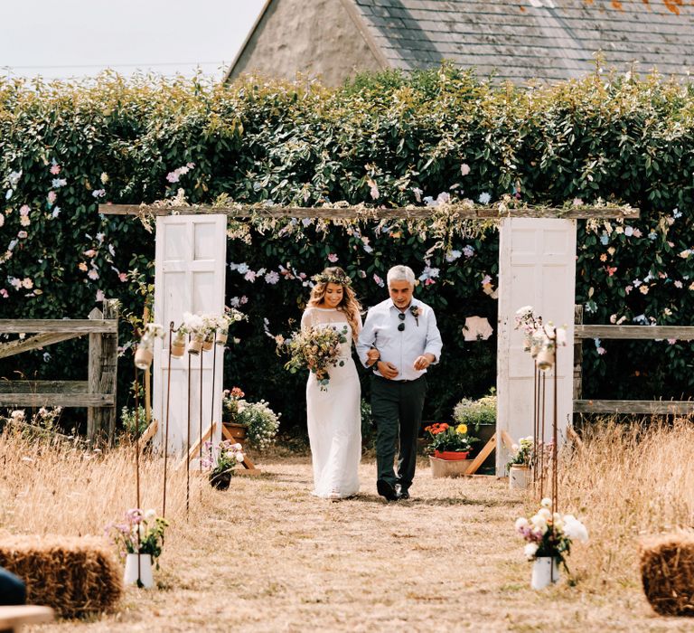 Bride walks up the aisle