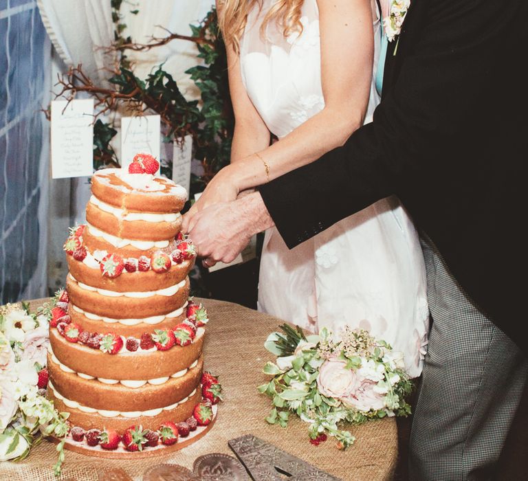 Cutting The Cake | Bride in Bespoke Wilden London Wedding Dress | Groom in Morning Suit | Pastel Wedding at Appuldurcombe on the Isle of Wight | Maryanne Weddings Photography | Wight Weddings