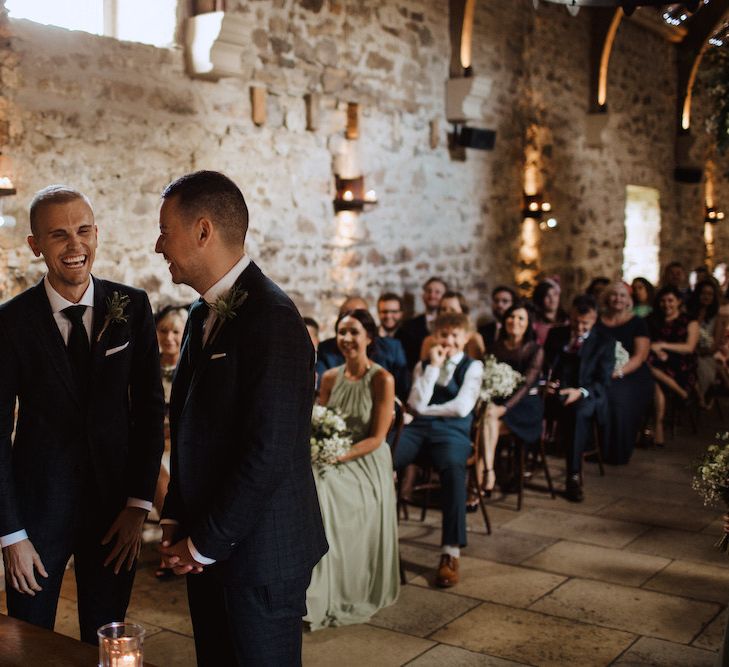 Two Grooms Laughing at the Altar of Their Healey Barn Wedding