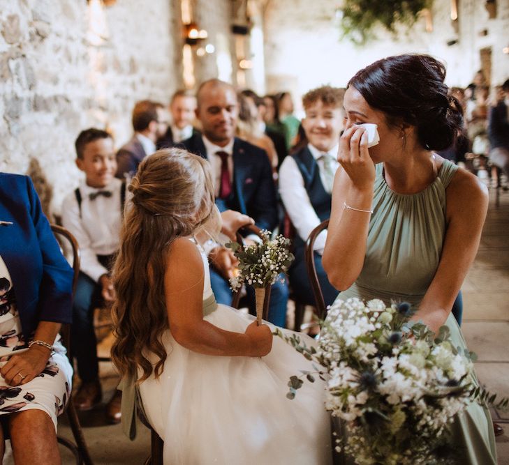 Emotional Bridesmaid During the Gay Wedding Ceremony