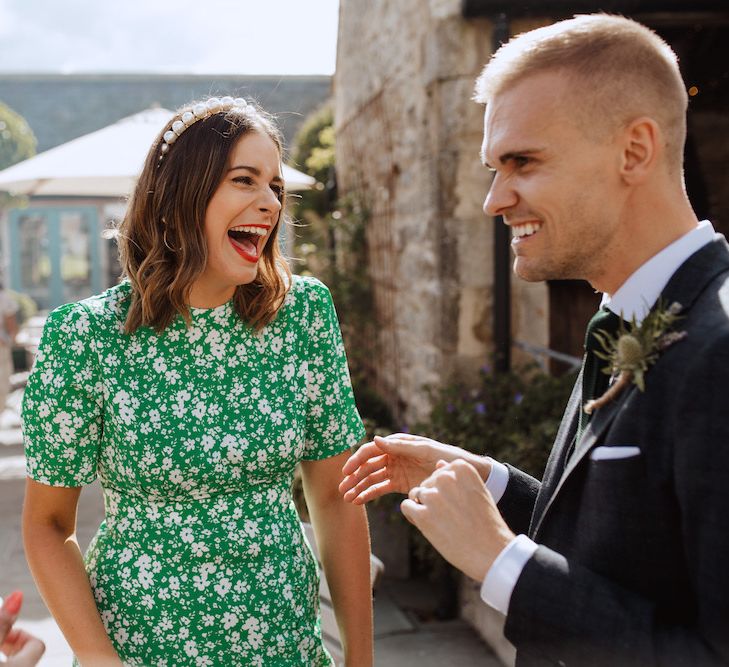 Wedding Guest in Green and White Dress with Pearl Alice Band