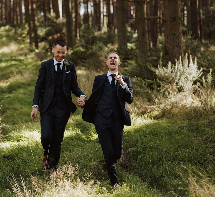 Two Grooms Laughing in the Woods