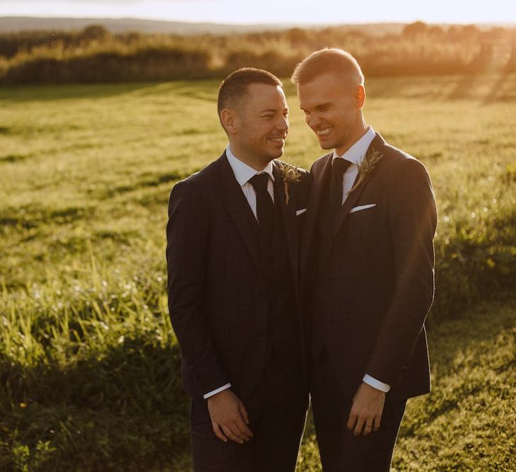 Golden Hour Portrait of Two Grooms at Their Gay Wedding