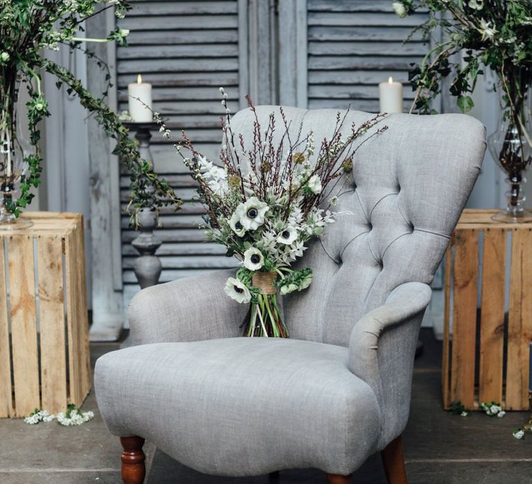 Anemone Bouquet Resting on Grey Chair