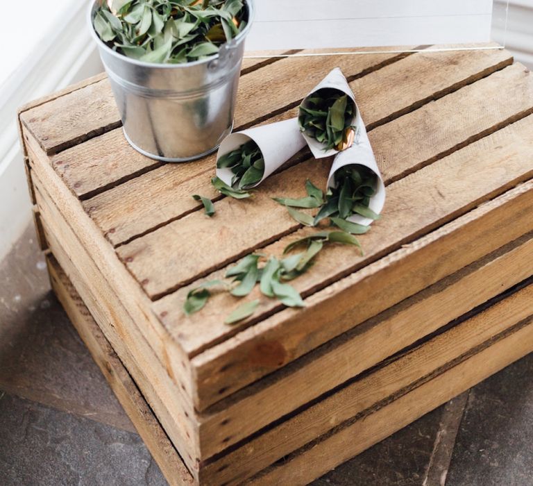 Foliage Filled Confetti Cones on Wooden Crate