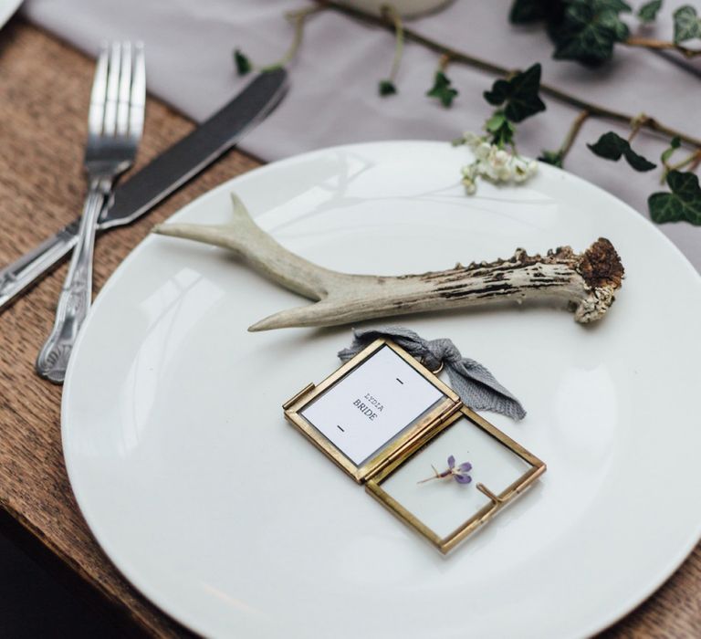 White Tableware with Wooden Antler and Miniature Frame Place Setting