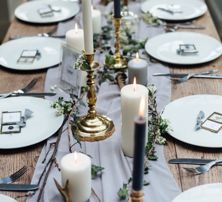 Gold Candlesticks and Taper Candles with Larger Candles