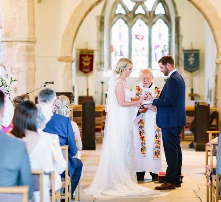 Church Wedding Ceremony | Bride in Claire Pettibone Whitney Bridal Gown with Cape | Groom in French Connection Navy Suit | DIY Country Wedding at Warborne Farm, Lymington | Camilla Arnhold Photography