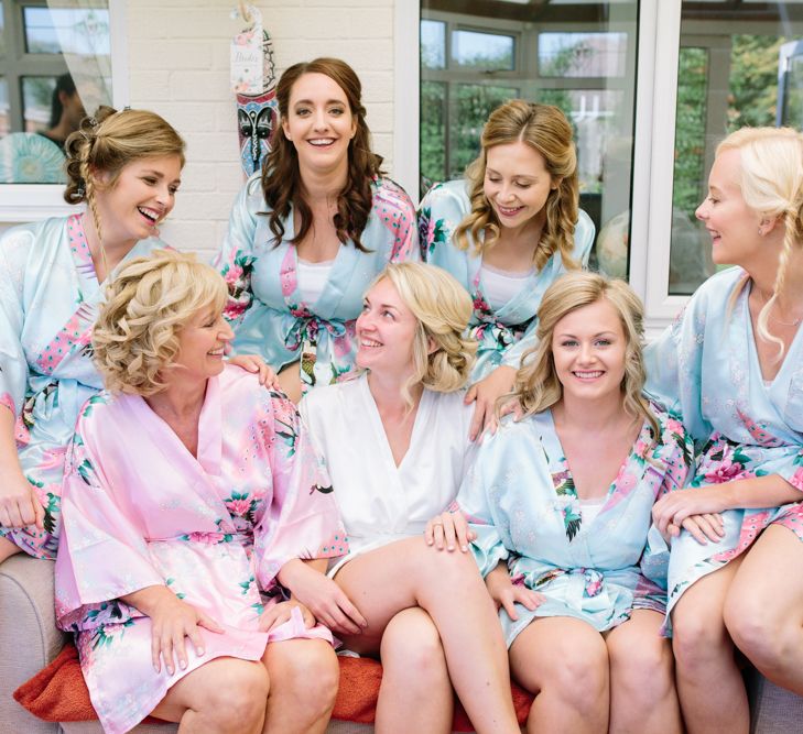 Wedding Morning Bridal Preparations in Matching Getting Ready Robes | DIY Country Wedding at Warborne Farm, Lymington | Camilla Arnhold Photography