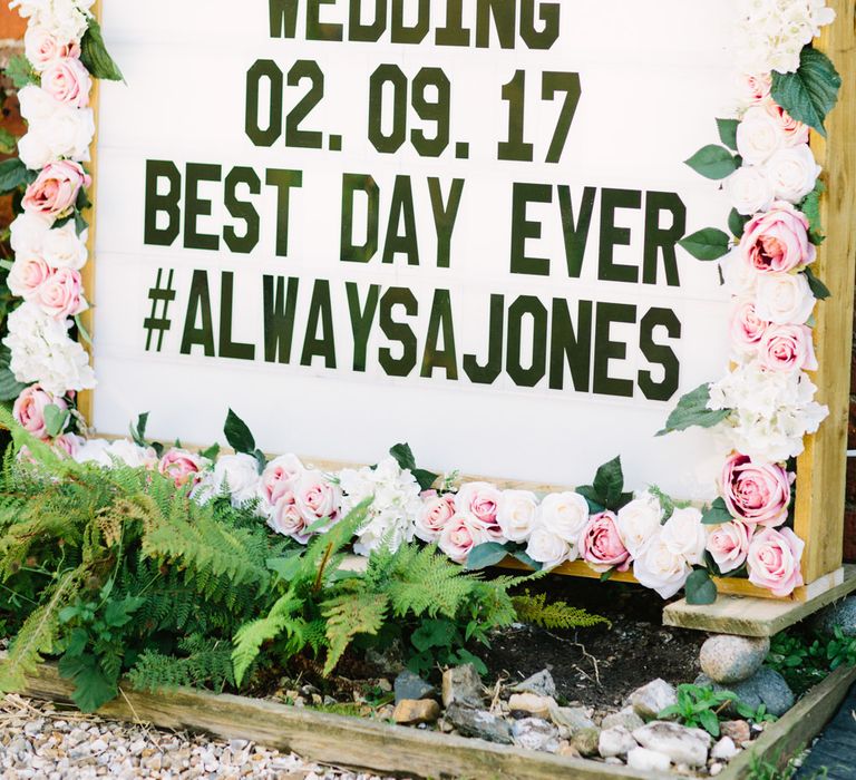 Floral Boarder Wedding Sign | DIY Country Wedding at Warborne Farm, Lymington | Camilla Arnhold Photography