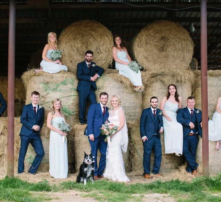 Wedding Party | Bride in Claire Pettibone Whitney Bridal Gown with Cape | Pale Blue Bridesmaid Dresses | Groomsmen in Navy Suits | DIY Country Wedding at Warborne Farm, Lymington | Camilla Arnhold Photography