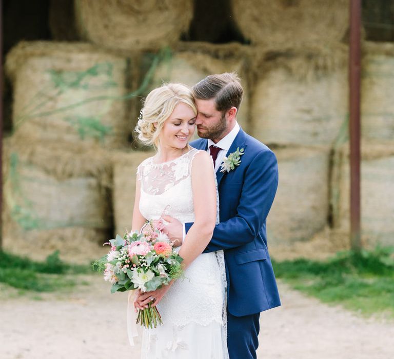 Bride in Claire Pettibone Whitney Bridal Gown with Cape | Groom in French Connection Navy Suit | DIY Country Wedding at Warborne Farm, Lymington | Camilla Arnhold Photography