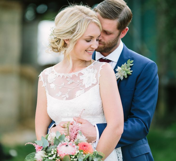 Bride in Claire Pettibone Whitney Bridal Gown with Cape | Groom in French Connection Navy Suit | DIY Country Wedding at Warborne Farm, Lymington | Camilla Arnhold Photography