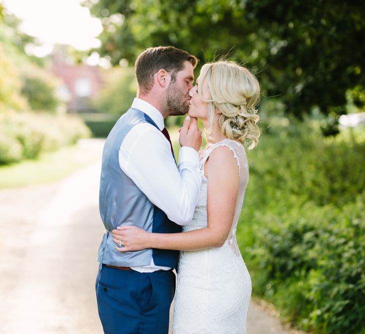 Bride in Claire Pettibone Whitney Bridal Gown with Cape | Groom in French Connection Navy Suit | DIY Country Wedding at Warborne Farm, Lymington | Camilla Arnhold Photography