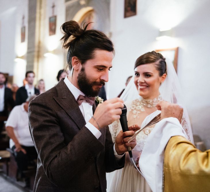 Wedding Ceremony | Bride in Sartoria Cucciaioni Wedding Dress | Groom in Brown Tweed Suit &amp; Bow Tie | Stylish Pink Wedding at Terzo di Danciano, Tuscany, Italy | Lucrezia Senserini Photography | Film by Righi Photography