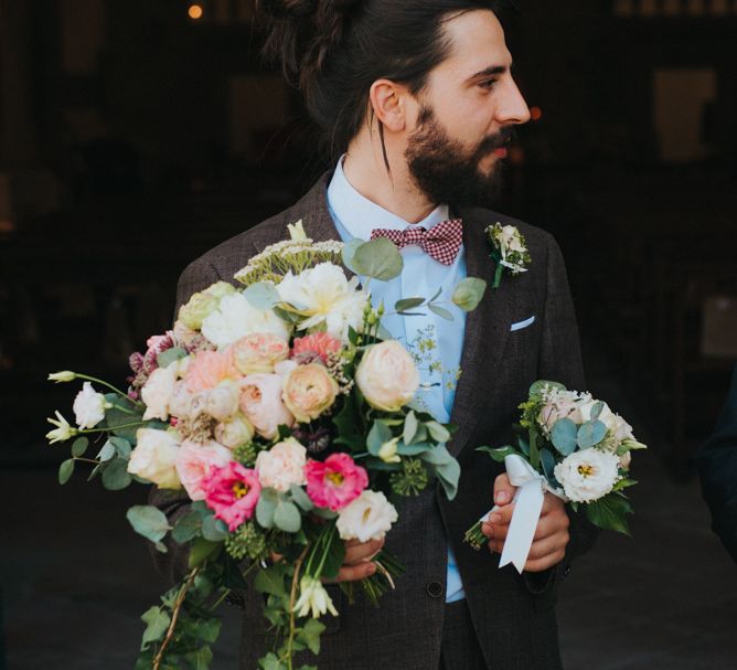 Bearded Groom in Brown Suit &amp; Bow Tie with Bridal Blush Bridal Bouquet | Stylish Pink Wedding at Terzo di Danciano, Tuscany, Italy | Lucrezia Senserini Photography | Film by Righi Photography