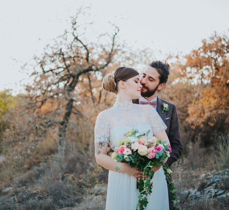 Bride in Sartoria Cucciaioni Wedding Dress | Groom in Brown Tweed Suit &amp; Bow Tie | Stylish Pink Wedding at Terzo di Danciano, Tuscany, Italy | Lucrezia Senserini Photography | Film by Righi Photography