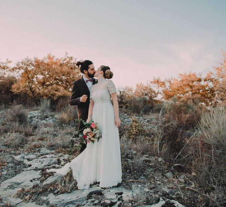 Bride in Sartoria Cucciaioni Wedding Dress | Groom in Brown Tweed Suit &amp; Bow Tie | Stylish Pink Wedding at Terzo di Danciano, Tuscany, Italy | Lucrezia Senserini Photography | Film by Righi Photography