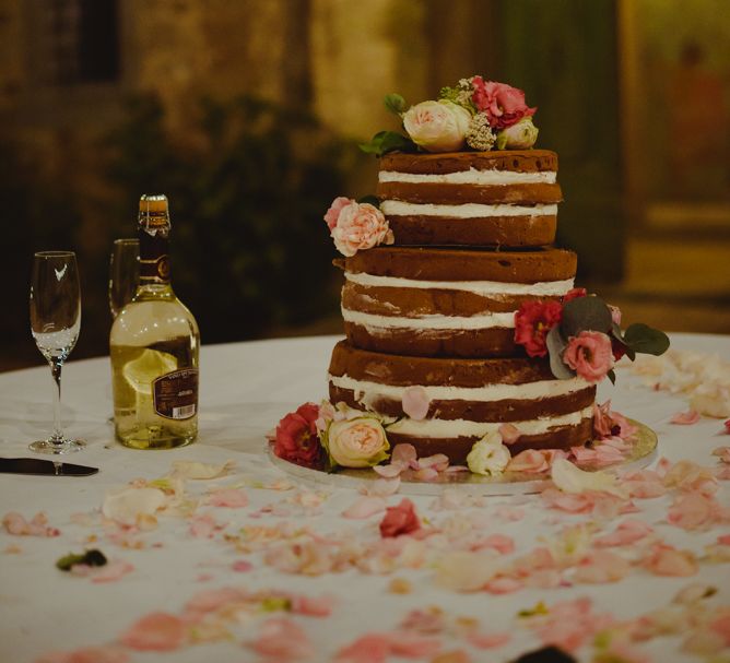 Naked Chocolate Wedding Cake | Stylish Pink Wedding at Terzo di Danciano, Tuscany, Italy | Lucrezia Senserini Photography | Film by Righi Photography