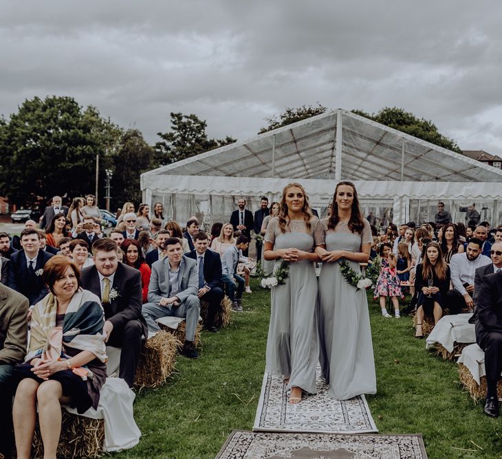 Outdoor Wedding Blessing with Bridesmaids in ASOS Dresses Walking Down the Moroccan Rug Aisle