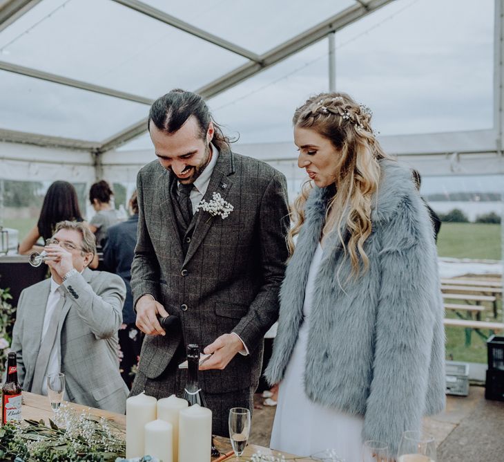 Bride and Groom Standing at the Top Table Giving Wedding Speeches