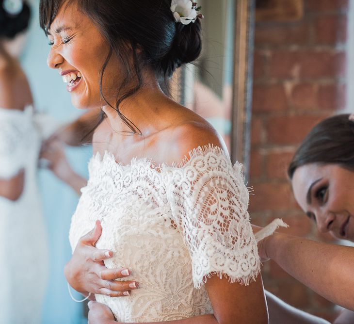 Bride in Lace Watters Dress with Bardot Neckline and Buttons Down Back | Smoke Bombs and Chinese Paper Fans Backdrop with Bride in Bardot Dress | Twig &amp; Vine Photography