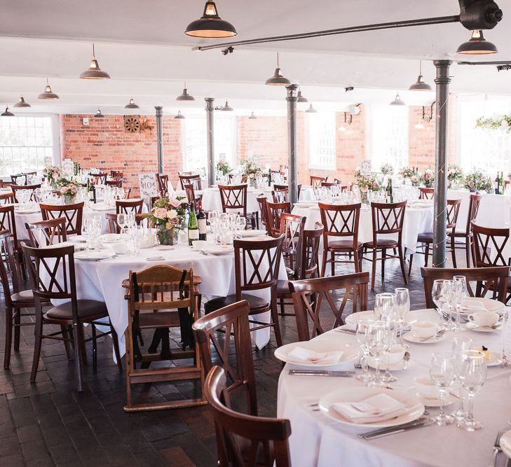 Floral Hanging Installation Over Top Table | Copper Industrial Lights | Copper Terranium Centrepieces | Dusky Pink Roses, White Peonies, Sweetpeas, Coffee-Coloured Phlox and Foliage in Hurricane Jars on Top Table | Wedding Reception at The West Mill | Smoke Bombs and Chinese Paper Fans Backdrop with Bride in Bardot Dress | Twig &amp; Vine Photography