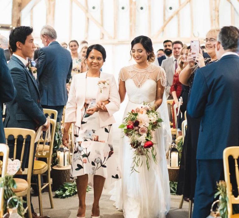 Mother of the Bride Walking Down the Aisle with Daughter in Catherine Deane Brides Dress