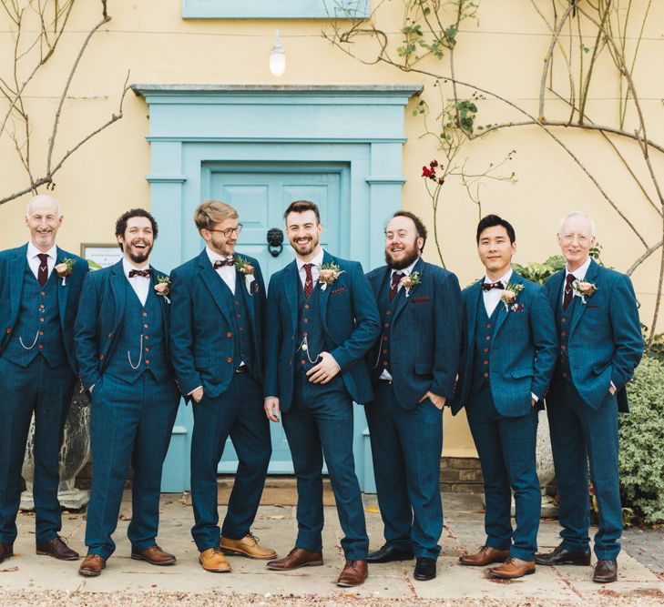 Groomsmen wearing suits from The Vintage Suit Hire Company