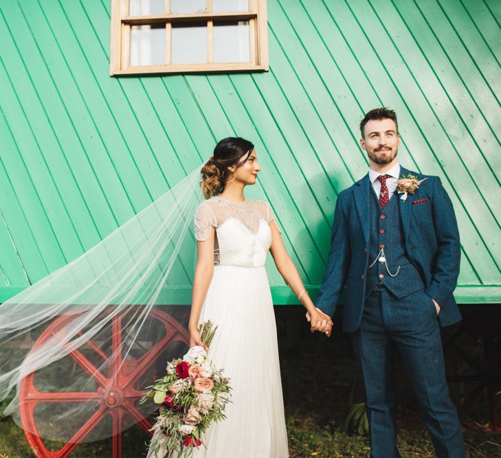 Bride and Groom with Veil and Caravan