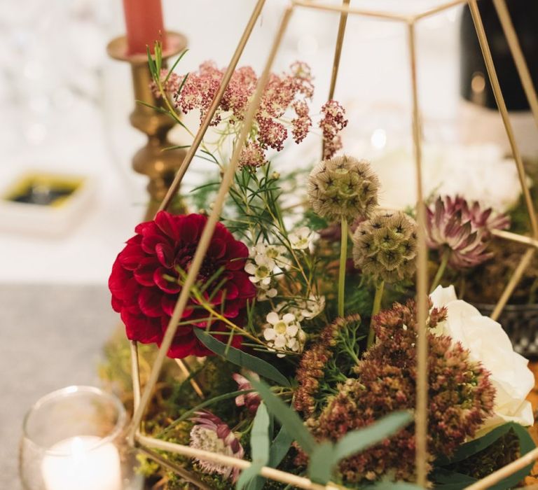 Geometric Gold Centre Pieces with Red Flowers