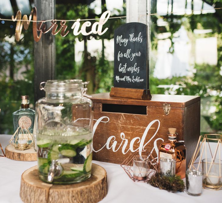 Wooden Card Box on Table with Drinks Dispenser and Just Married Bunting