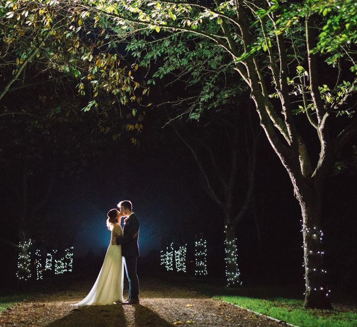 Evening Wedding with Fairylights on Trees