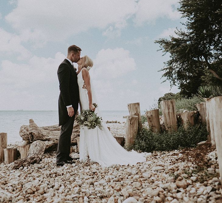 Beach Portrait with Bride in a Rime Arodaky Wedding Dress and Groom in Traditional Tails