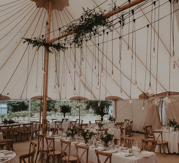 Sperry Tent Reception with Hanging Edison Light Bulb Installation