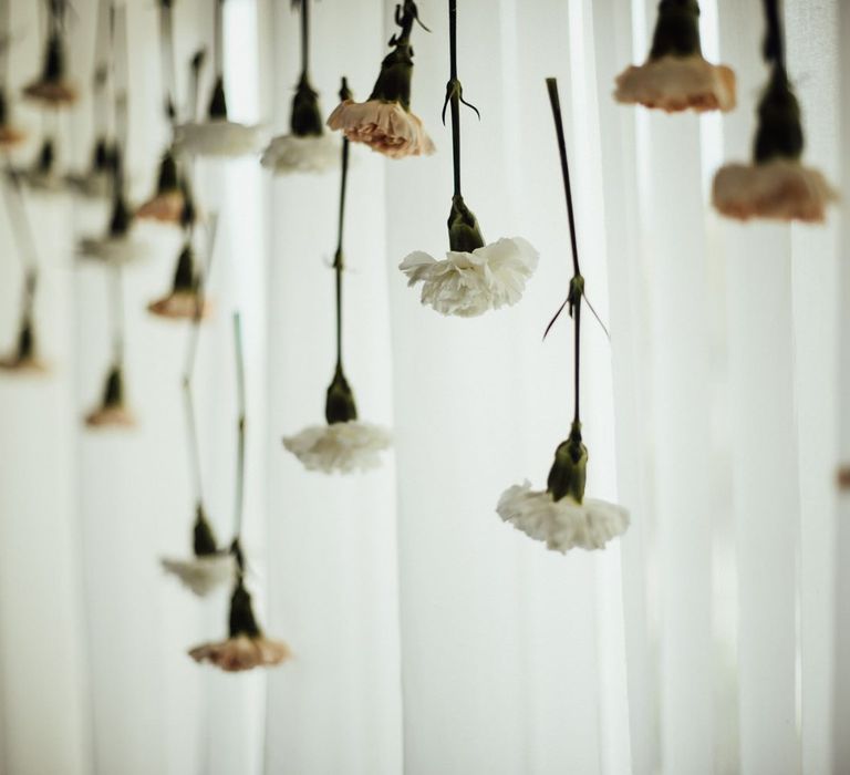 Hanging flowers at Oxfordshire barn wedding