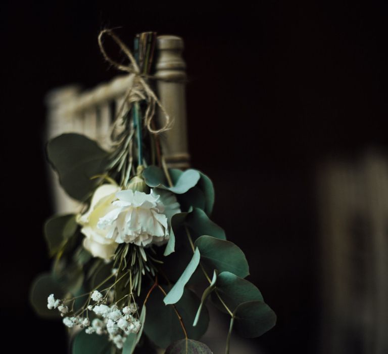 Wedding chair back decor at Oxfordshire barn wedding ceremony