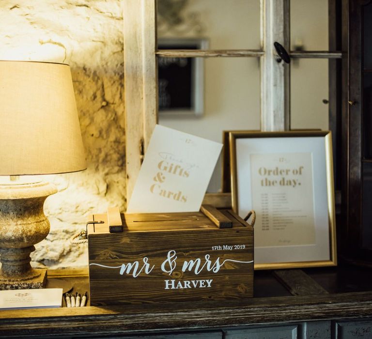 Wooden card box with order of service wedding sign