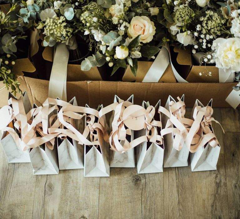 Bridesmaid gift bags with wedding flowers