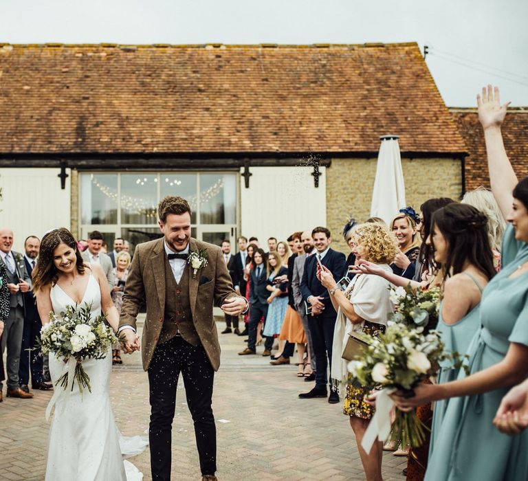 Confetti exit for bride and groom