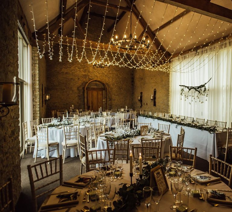 Oxfordshire barn wedding venue with fairy light canopy