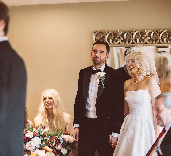 Wedding Ceremony | Bride in Organza Justin Alexander Gown | Groom in Black Tie Suit | Blush Pink &amp; Red, Christmas, Winter Wedding at Coltsfoot Country Retreat | Lemonade Pictures