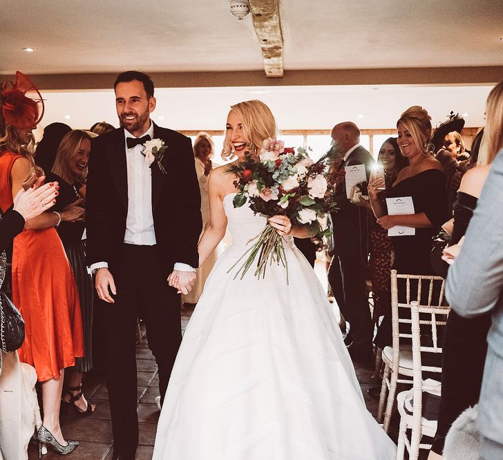 Bride in Organza Justin Alexander Gown | Groom in Black Tie Suit | Blush Pink &amp; Red, Christmas, Winter Wedding at Coltsfoot Country Retreat | Lemonade Pictures